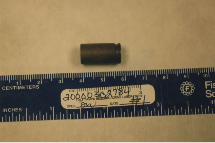 shell casing with ruler