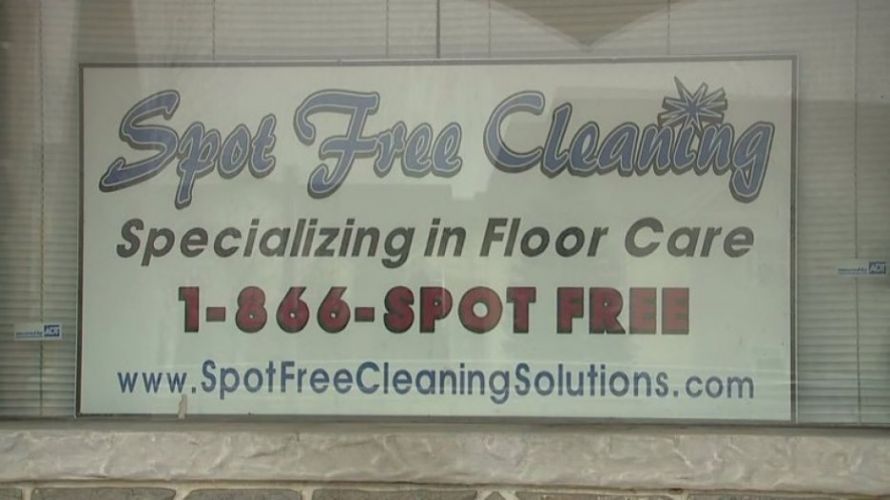 Spot Free Cleaning ad on a building