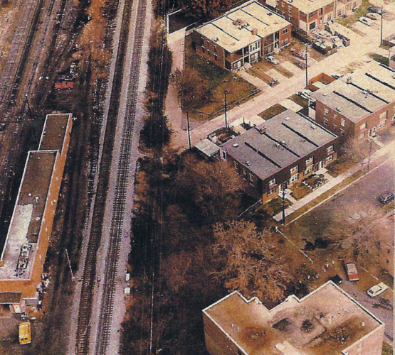 picture of buildings and train tracks from above