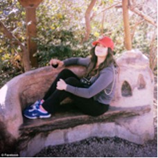 Krystal Mitchell on a bench